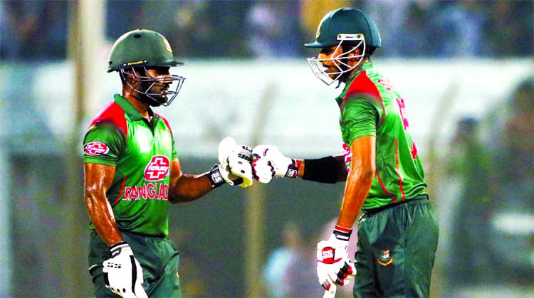Imrul Kayes (left) and Soumya Sarkar both ton-hitters toasting after putting on together 220 runs for the second wicket partnership during the third ODI between Bangladesh and Zimbabwe at the Zahur Ahmed Chowdhury Stadium in Chattogram on Friday. Banglade