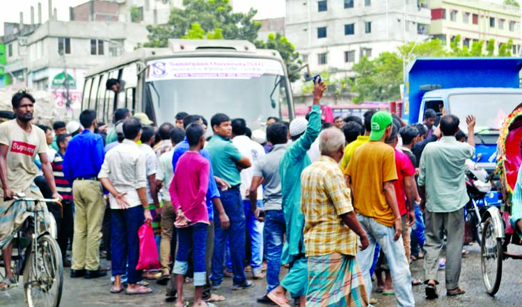 Transport workers creating barrier to vehicle movement in the city during transport strike demanding amendment to Road Transport Act 2018 yesterday.