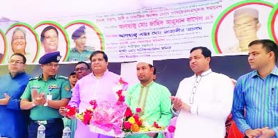 GAZIPUR: Moniruzzaman Monir, Councilor, Ward No 38 handing over boat symbol to Jahid Ahsan Rasel MP and President of Parliamentary Standing Committee on Ministry of Youth and Sports at a discussion meeting on anti- militant, drug abuse and terrorism