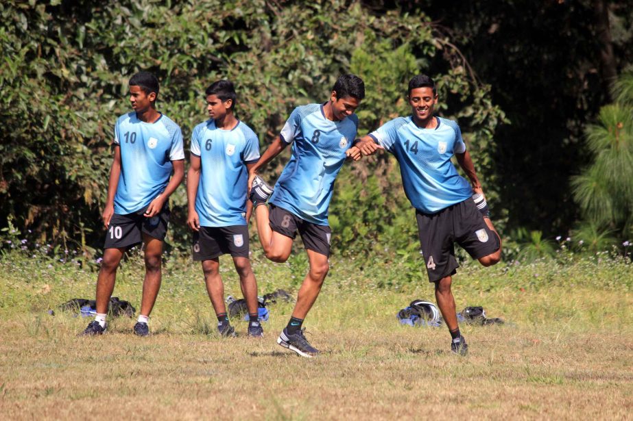 Players of Bangladesh Under-15 Football team during their practice session at Kathmandu, the capital city of Nepal on Sunday.