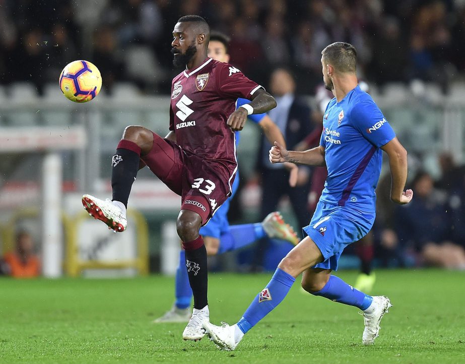 Torino's Nicolas Nkoulou goes for the ball during the Serie A soccer match between Torino and Fiorentina at the Olympic Stadium in Turin, Italy on Saturday.