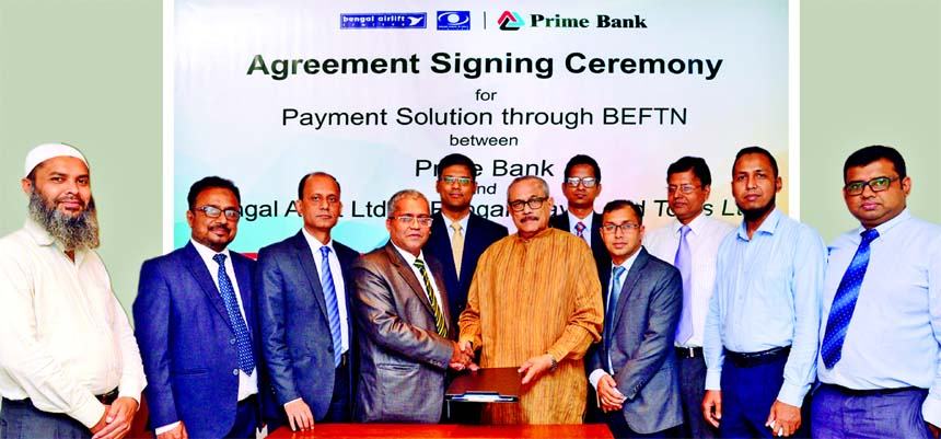 Md. Touhidul Alam Khan, DMD of Prime Bank Limited and Rezaur Rahman, Managing Director of Bengal Airlift Limited and Bengal Travel and Tours Limited, exchanging an agreement signing document for Payment Solution through BEFTN at the Bank's head office in