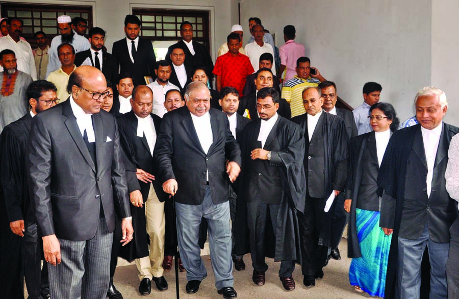 Dr Kamal Hossain and Advocate Khandker Mahbub Hossain along with others, coming out from the courtroom after taking part in the writ hearing on Division for Barrister Mainul Hosein on Sunday.