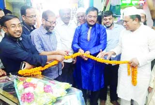 FENI: Ainul Kabir Shameem, President, Feni Poura Awami League and former President Feni Chamber of Commerce and Industry inaugurating a Juboraj Fashion House at Ali Ahmed Tower on Sunday.