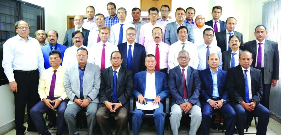 Md. Abdus Salam Azad, CEO of Janata Bank Limited, poses for a photo session with the participants of a training programme on 'Anti-Money Laundering and Combating the Financing of Terrorism for Executives' organized by the Bank's Staff College in the ci