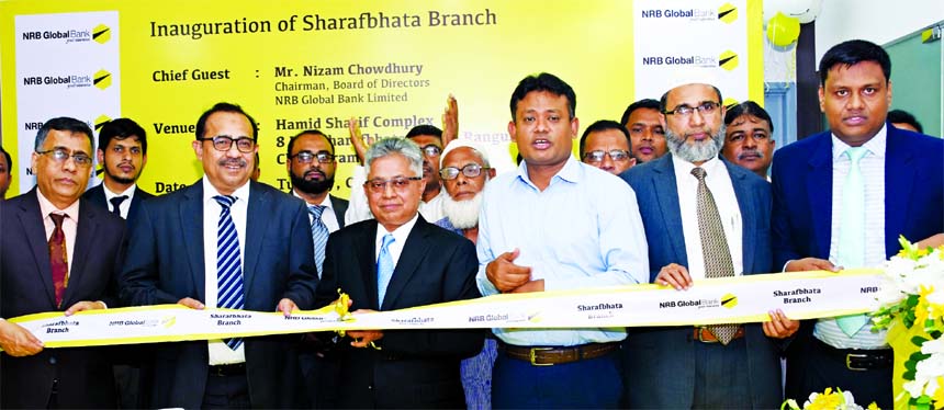 Nizam Chowdhury, Chairman of NRB Global Bank Limited, inaugurating its Sharafbhata Branch at Rangunia in Chattogaram on Tuesday. Syed Habib Hasnat, Managing Director and other senior officials of the Bank were also present.