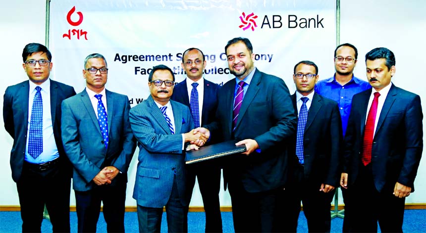 Sajjad Hussain, Managing Director (CC) of AB Bank Limited and Mostafa Kamal Ahmed, Head of Finance of Third Wave Technologies Limited (NAGAD), exchanging an agreement signing document at the Bank's head office in the city recently. Under the deal, the ba