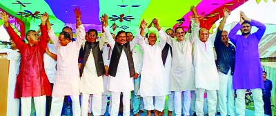 SAKHIPUR (Tangail): Leaders of Sakhipur and Basail Upazila Awami League and its front organisations raising hands at a meeting demanding nomination of Juaharul Islam VP Juahar, General Secretary, Tangail District Awami League from Tangail -8 Constit