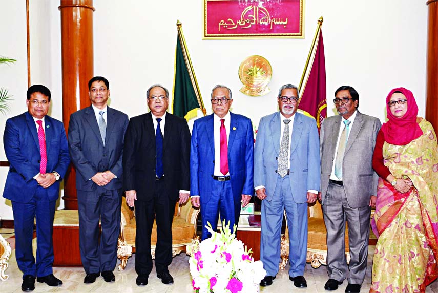 EC team led by CEC KM Nurul Huda meets President Abdul Hamid at Bangabhaban on Thursday.