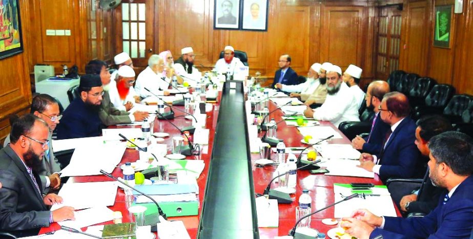 Mufti Sayeed Ahmad, Vice-Chairman of Shari`ah Supervisory Committee of Islami Bank Bangladesh Limited, presiding over its meeting at the Bank's head office in the city on Thursday. Mohammed Monirul Moula, AMD, Dr. Mohammad Abdus Samad, Member Secretary a