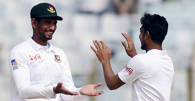 Mahmudullah Riyad (left) of Bangladesh celebrate with his teammate Mehidy Hasan Miraz after dismissal of Sean Williams ( not in the picture) during the first day of the first Test between Bangladesh and Zimbabwe at Sylhet International Cricket Stadium on