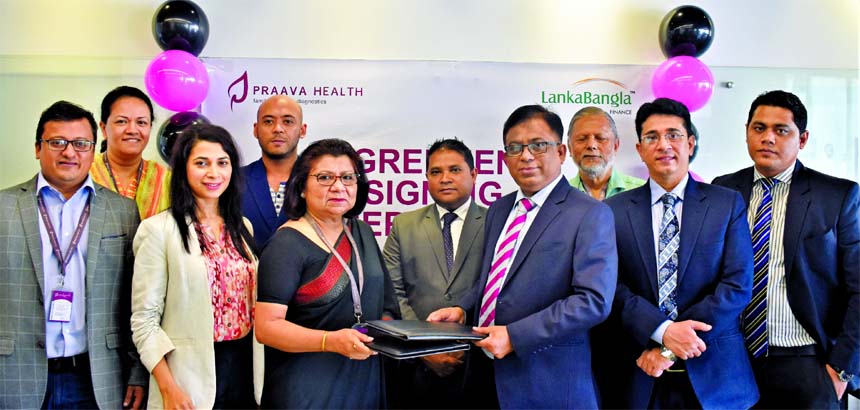 Khurshed Alam- Head of Retail Finance of LankaBangla Finance Ltd and Dr. Simeen Majid Akhtar, Senior Medical Director of Praava Health sign an MOU for their respective organizations recently. Under this deal, the finance company will enjoy up to 15pc dis