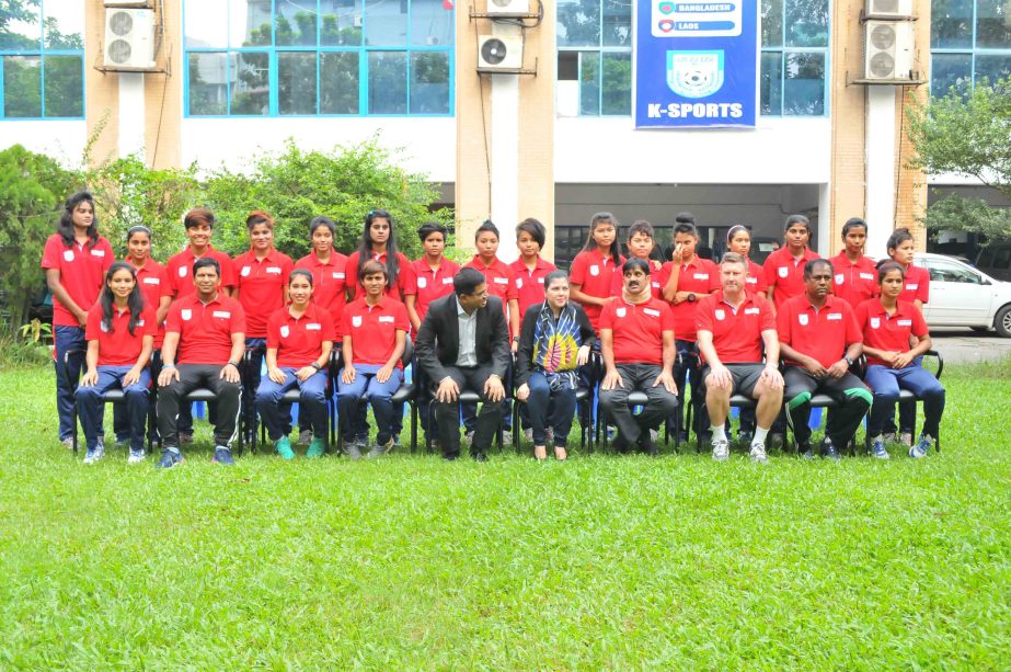 Members of Bangladesh Women's Olympic Football team pose for a photo session at the premises of Bangladesh Football Federation House on Sunday before leaving for Myanmar today.
