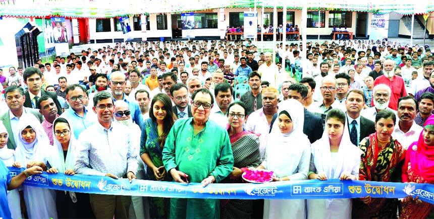 A Rouf Chowdhury, Chairman of Bank Asia Limited, inaugurating its new Agent Banking Outlet at Mamun Nagar in Gazipur City on Saturday. Zakia Rouf Chowdhury, Executive Vice-Chairperson of Rangs Group, Romana Rouf Chowdhury, Director, Md. Arfan Ali, Managin