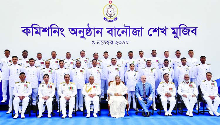 Prime Minister Sheikh Hasina joins a photo session with Security Adviser and Naval Personnel while attending a programme marking the Commissioning of new Naval base 'BNS Sheikh Mujib' in city's Khilkhet area on Monday.