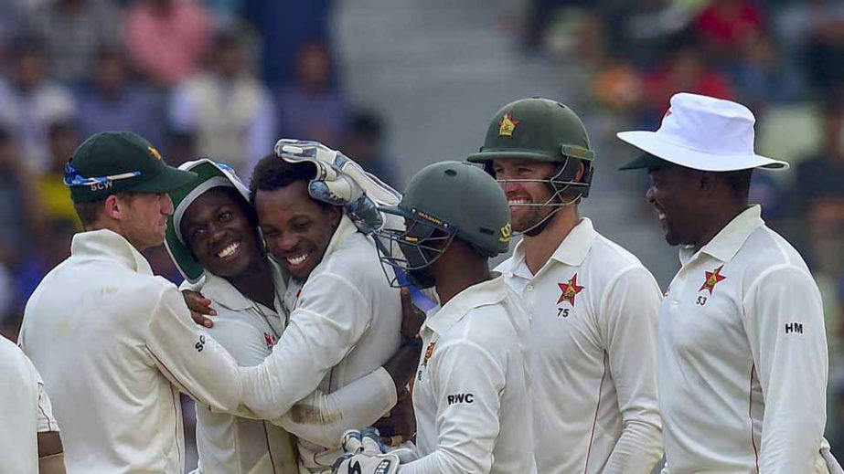 Players of Zimbabwe celebrating after beating Bangladesh in the first Test at Sylhet International Stadium on Tuesday.