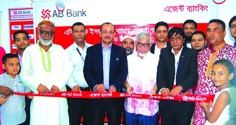 Syed Mizanur Rahman, Head of Agent Banking of AB Bank Limited, inaugurating its Agent Banking outlet at Islampur Bazar in Bijoynagar of Brahmanbaria recently. Md. Shafikul Islam, Ex. Independent Director of Bangladesh Bank and local elites were also prese