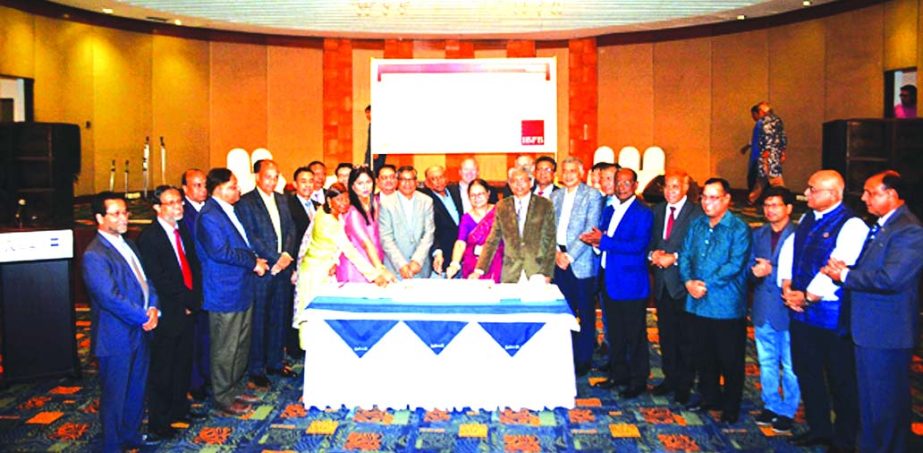 Humayun Rashid, President of International Business Forum of Bangladesh (IBFB), a non-profit and non-partisan research and advocacy based nationwide trade body, inaugurating its 13th anniversary programme by cutting a cake at a hotel in the city on Monday