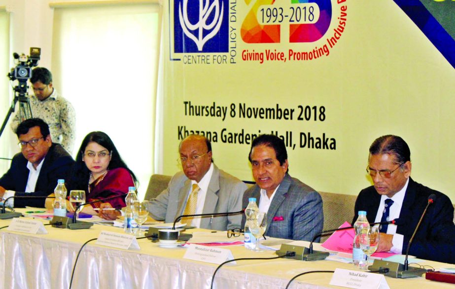 NBR Chairman Md. Mosharraf Hossain Bhuiyan, addressing at a dialogue on â€˜Catalysing Development Finance for Bangladeshâ€™ at a hotel in the city on Thursday as chief guest.