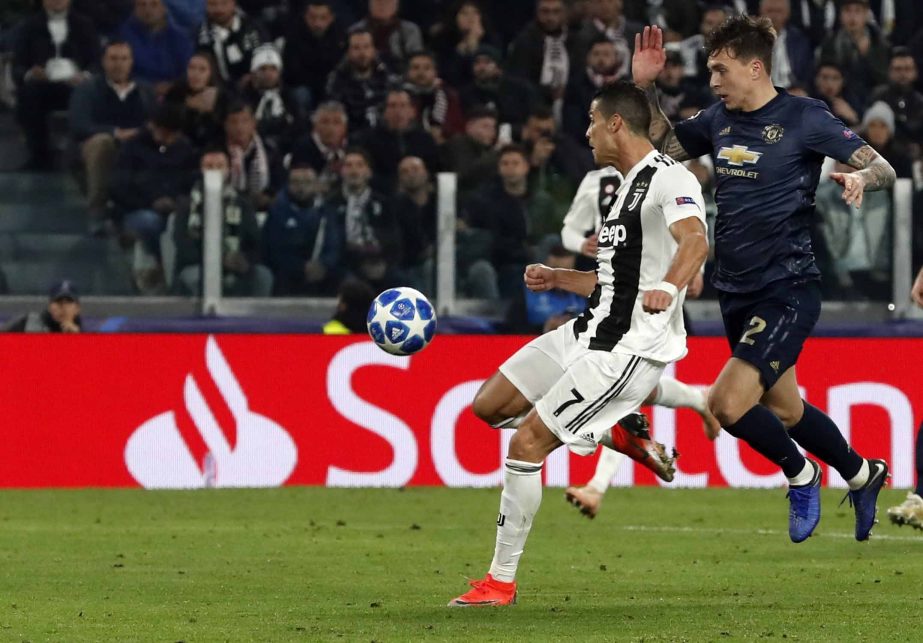 Juventus forward Cristiano Ronaldo scores his side's opening goal during the Champions League group H soccer match between Juventus and Manchester United at the Allianz stadium in Turin, Italy on Wednesday.