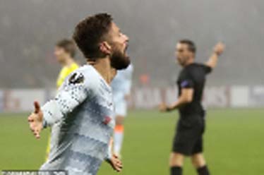 Chelsea's Oliver Giroud celebrates scoring his side's first goal during the Europa League group L soccer match between Bate and Chelsea at the Borisov-Arena in Borisov, Belarus on Thursday.