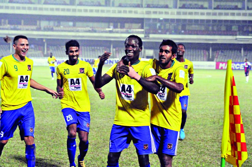 Players of Sheikh Jamal Dhanmondi Club Limited celebrating after scoring a goal against Saif Sporting Club in their quarter-final match of the Walton Federation Cup at the Bangabandhu National Stadium on Friday. Sheikh Jamal won the match 2-1.