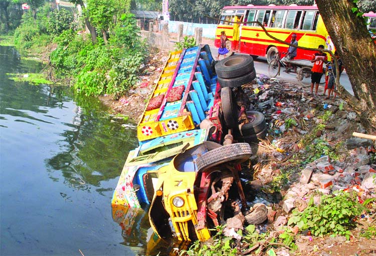 A goods-laden truck skidded into a roadside ditch at Kather Pool area in Jatrabari due to reckless driving early morning on Friday.