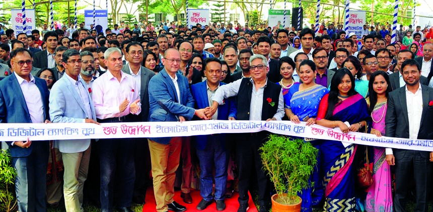 A Rumee A Hossain, Chairman, Board of Directors of Bank Asia Limited, inaugurating the 'RMG Digital Banking Booth' at Echotex Limited in Gazipur on Saturday. Mohammad Bin Kashem, Director of Echotex Limited, Md. Nasir Uddin, Director of BGMEA, Md Arfan