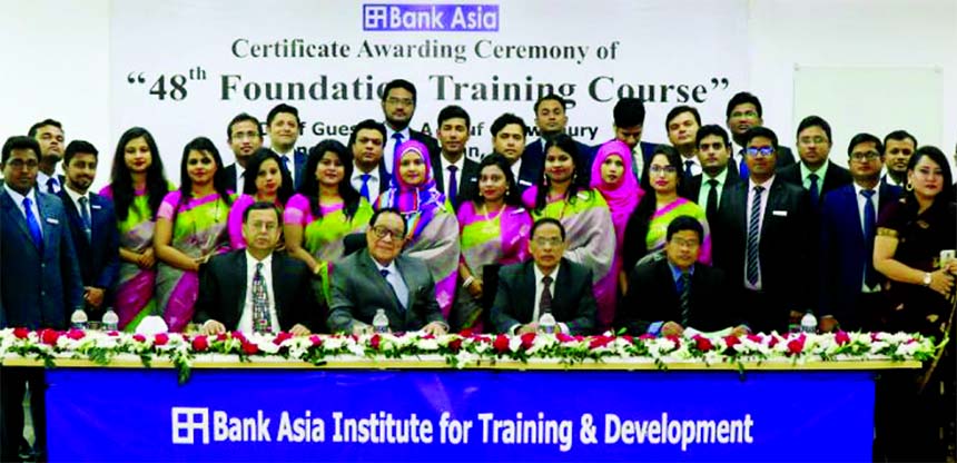 A Rouf Chowdhury, Chairman of Bank Asia poses for a photo session with the participants of 48th Foundation Training Course at its training institute on Sunday. KS Nazmul Hasan, Head of Human Resource Division (HRD) of the Bank, Md. Azharul Islam, Head of