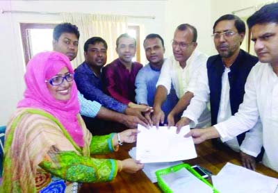 Fatema Parvin, Vice-Chairman of Patharghata Upazila Parishad collecting nomination form for Barguna-2 Constituency from Bangladesh Awami League Office at Dhanmondi on Sunday.