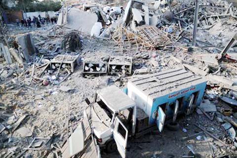 A view shows the site of Israeli air strikes on Hamas's TV station building, in Gaza City on Tuesday.