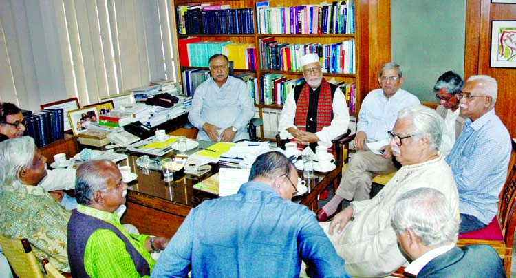 Jatiya Oikyafront Convener Dr Kamal Hossain holding an emergency meeting with other senior leaders at his Motijheel office on Tuesday.