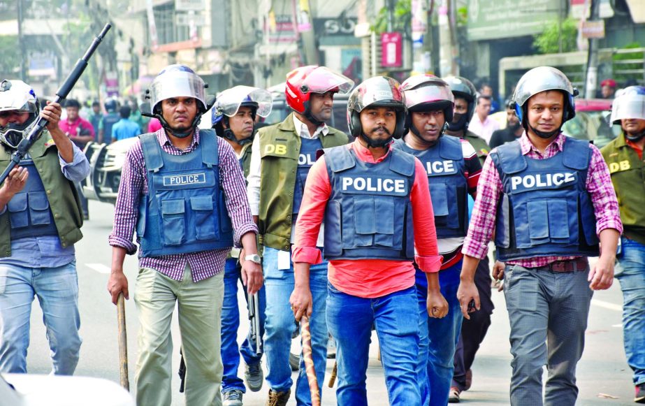 Police in action during the clashes with BNP supporters. The snap was taken from in front of the party central office in the city's Nayapalton on Wednesday.