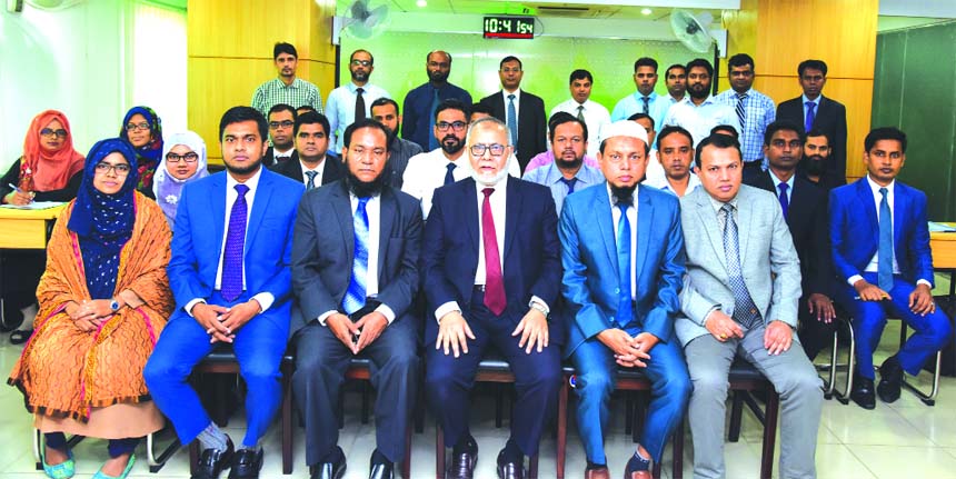 Md. Fazlul Karim, DMD of Al-Arafah Islami Bank Limited, poses with the participants of a 5 day-long training course on 'Foreign Exchange & International Trade' at the Banks Training & Research Institute in the city on Sunday. Md. Abdur Rahim Duary, Prin