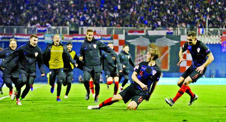 Croatia`s Tin Jedvaj celebrates with his teammates after scoring a goal against Spain at Stadion Maksimir,Zagreb, Croatia on Thursday.