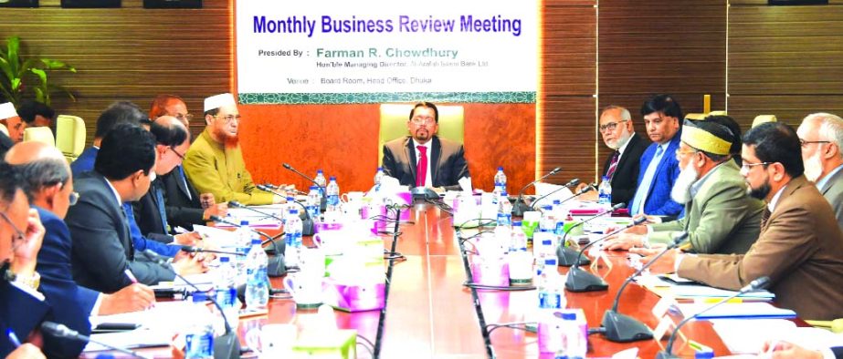 Farman R Chowdhury, Managing Director of Al-Arafah Islami Bank Limited, presiding over its Monthly Business Review Meeting at its head office in the city on Tuesday. Md. Fazlul Karim, Muhammad Mahmoodul Haque, Mohammad Zubair Wafa, DMDs, Head Office Execu