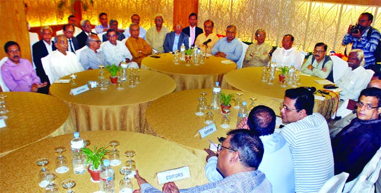Dr. Kamal-led Jatiya Oikyafront leaders exchanging views with editors of print media at Hotel Lakeshore in city on Friday.