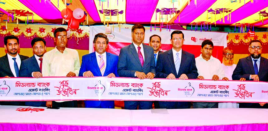 Md. Ahsan-uz Zaman, Managing Director of Midland Bank Limited, inaugurating its agent banking centre at Sonahata Bazar under Dhunot Thana of Bogura on Saturday. Md. Ridwanul Haque, Head of Retail Distributions and Agent Banking Division of the Bank was a