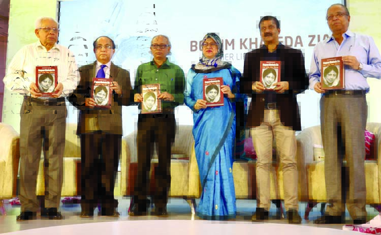 The cover unwrapping ceremony of book tilted -Begum Khaleda Zia : Her life , her way written by eminent journalist Mahfuz Ullah was held at Lakeshore Hotel in the city yesterday. Author of the book Mahfuz Ullah seen among others with the book at the c