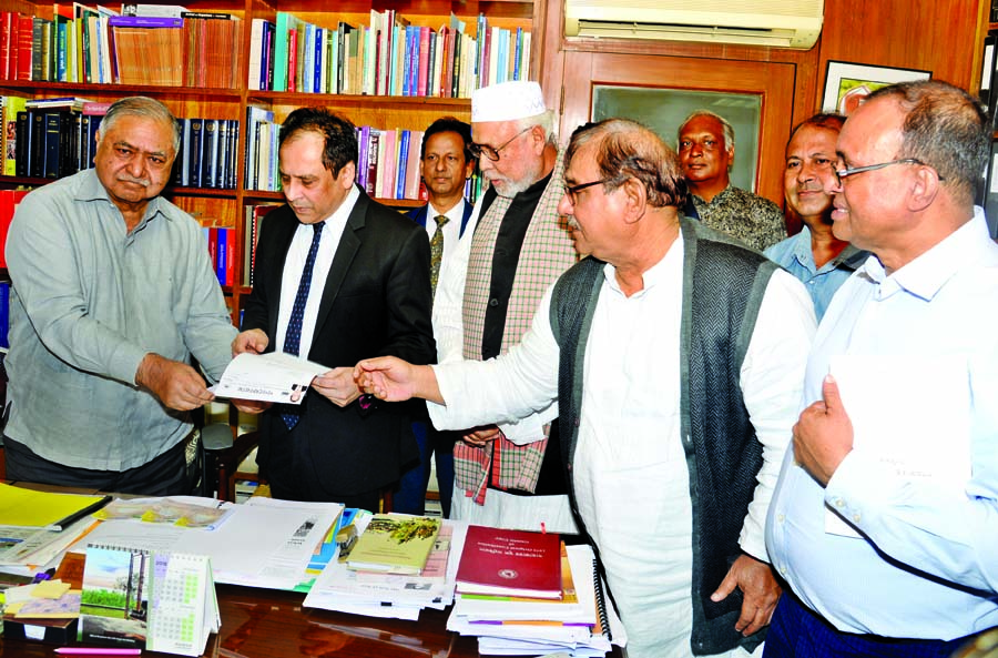 Dr Reza Kibria, son of slain SAMS Kibria, former Finance Minister submitting nomination form to Dr Kamal Hossain on Sunday as member of Gano Forum under the banner of Jatiya Oikyafront from Habiganj Constituency.