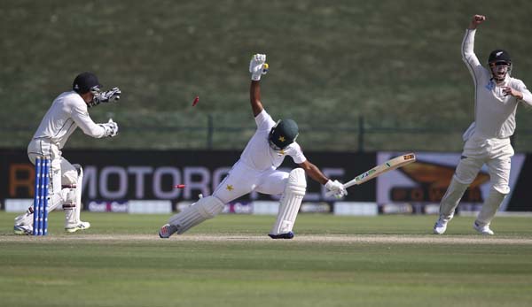 New Zealand's players appeal the dismissal of Pakistan's Asad Shafiq in their Test match in Abu Dhabi, United Arab Emirates on Monday.