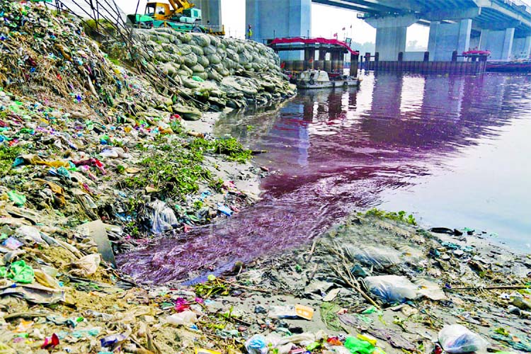 Due to dumping of industrial waste, the water of Shitalakkhya River has been badly contaminated. This picture was taken from Kanchpur area on Tuesday.
