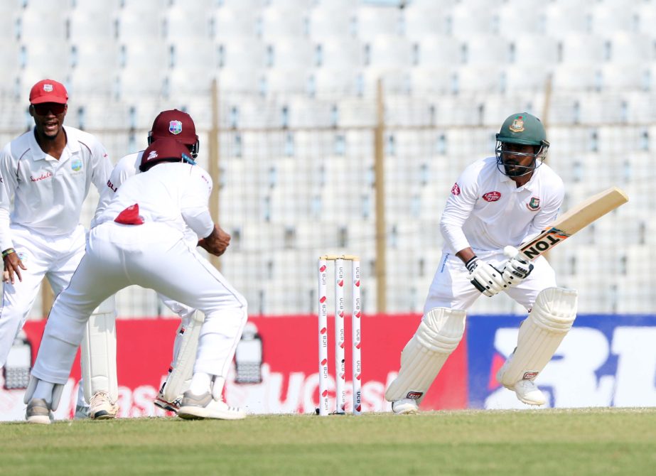 Imrul Kayes (right) of Bangladesh plays a shot during the first day play of the first Test between Bangladesh and West Indies at Zahur Ahmed Chowdhury Stadium in Chattogram on Thursday.