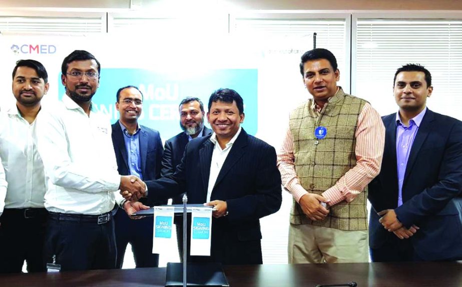 Abul Kasem Mohiuddin Al-Amin, Chief Procurement Officer of Grameenphone (GP), Khondaker Abdullah Al Mamun, Chairman of CMED Health and Minhaz Khan, Managing Director of Inovace, exchanging a MoU signing documents at GP House in the city recently. Under th