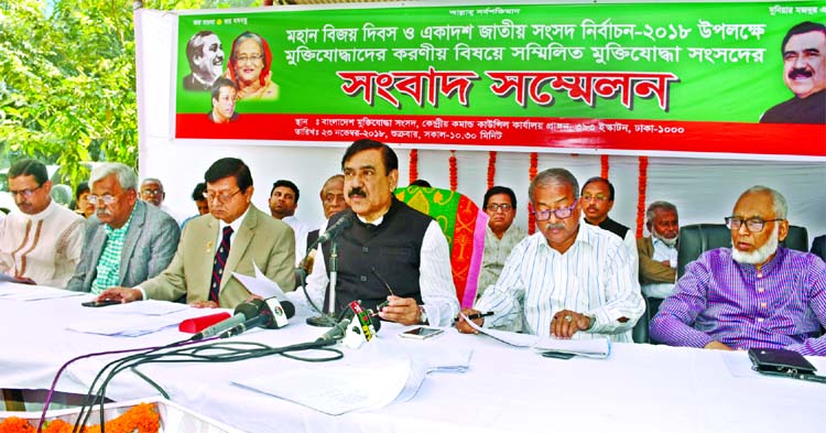 Shipping Minister Shajahan Khan speaking at a press conference on 'Glorious Victory Day and Eleventh Parliamentary Election-2018' organised by Bangladesh Muktijoddha Sangsad at its office in the city on Friday.