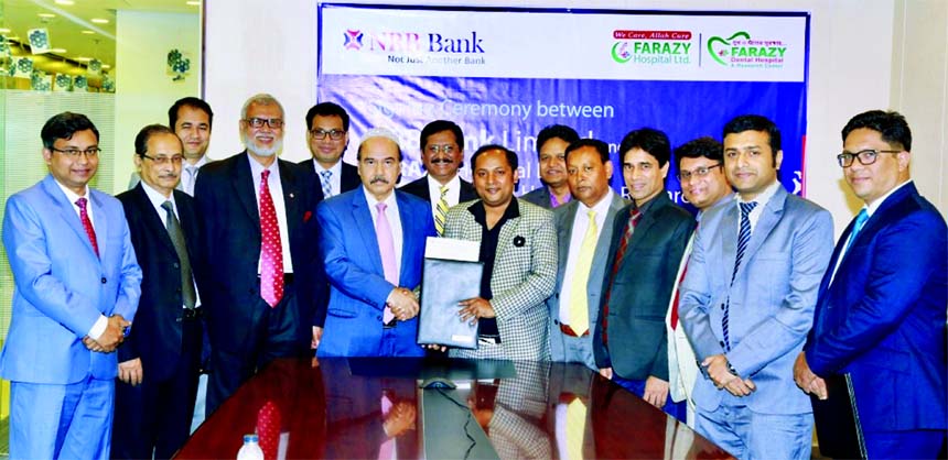 Saaduddin Ahmed, DMD of NRB Bank Limited and Dr. Anower Farazy Emon, Chairman of Farazy Hospital Limited and Farazy Dental Hospital & Research Center, exchanging an agreement signing document at the Bank's head office in the city recently. Under the deal