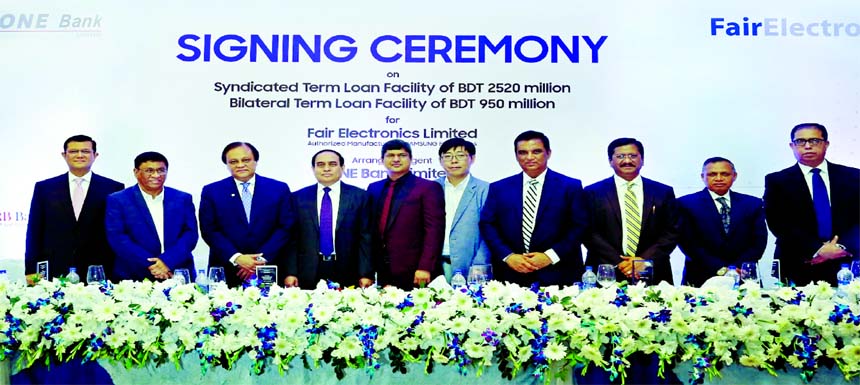 Managing Director of Fair Electronics Limited and senior officials of participating lenders are seen at an agreement signing ceremony held on Thursday for raising finance of total TK 3470 million under the lead arrangement of ONE Bank Limited for Fair Ele