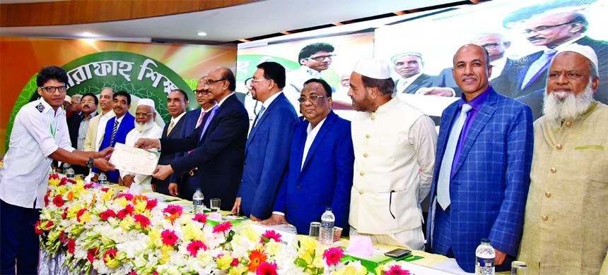 Bangladesh Bank (BB) Governor Fazle Kabir, handing over Scholarship Certificates to the students who passed HSC or equivalent exams in 2018 organized by Al-Arafah Islami Bank Limited at city's Officers Club on Saturday as chief guest. Abdus Samad Labu,Ch