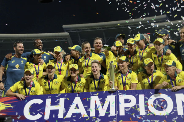 The Australian women's cricket team pose for a photo after winning the final of the Women's World Twenty20 against England in North Sound, Antigua on Saturday.