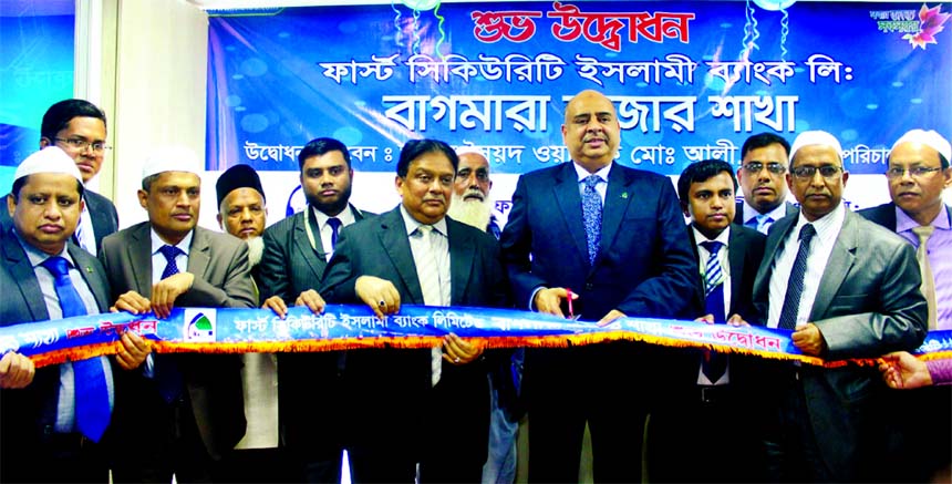 Syed Waseque Md Ali, Managing Director of First Security Islami Bank Limited, inaugurating its new branch at Bagmara Bazar in Lalmai in Cumilla on Monday. Abdul Aziz, AMD, SM Nazrul Islam, Head of General Services Division of the Bank and local elites wer